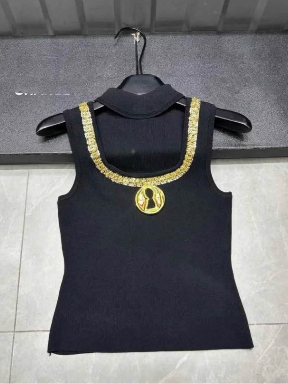 Sleeveless Black Knit Top with Gold Embellished Neckline